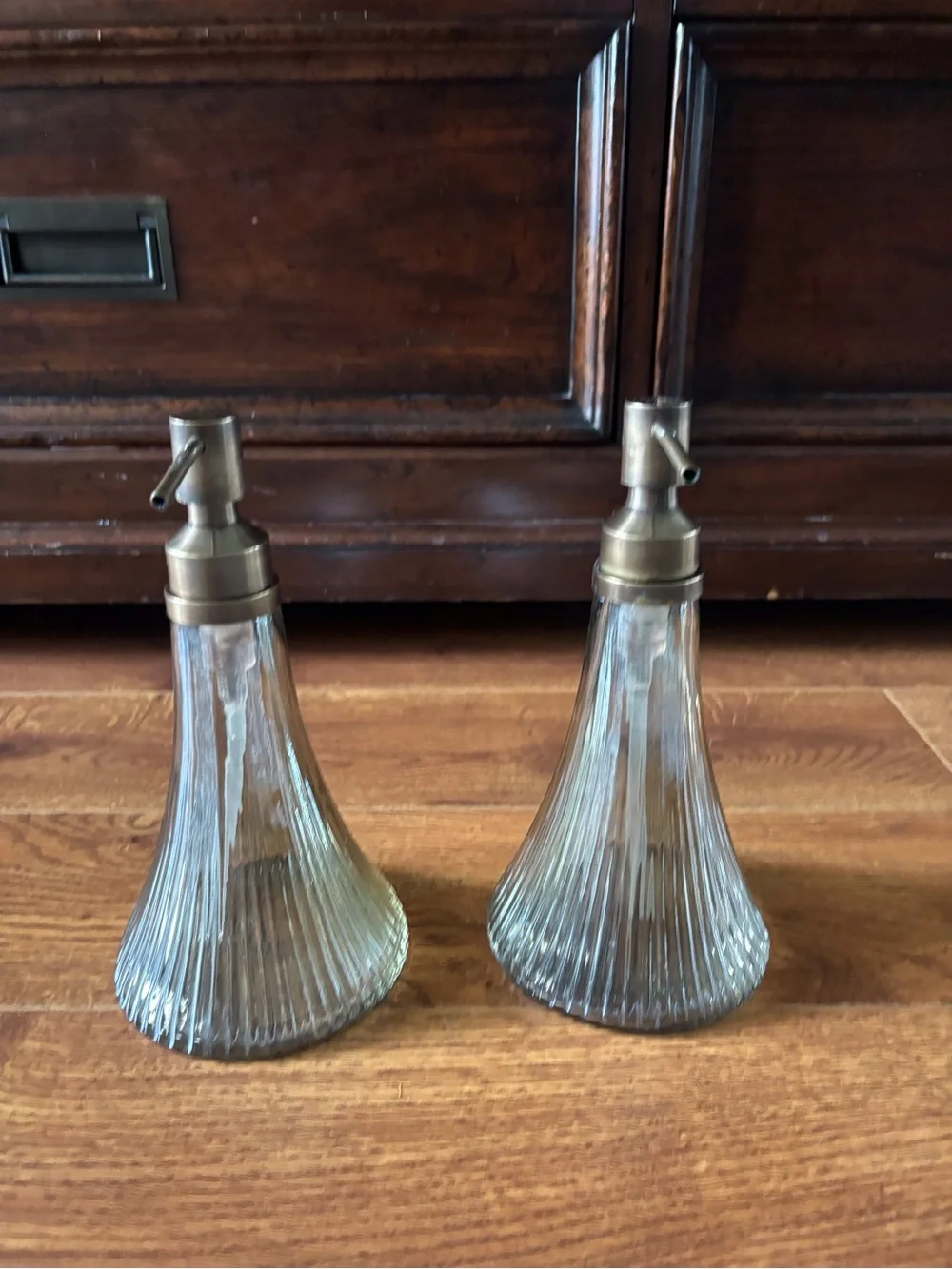 Pair of Ribbed Glass Soap Dispensers with Brass-Tone Pumps